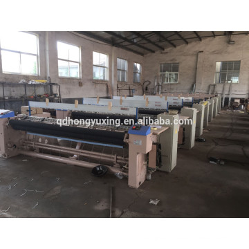 Heavy duty and high speed air jet loom/cotton fabric weaving machine